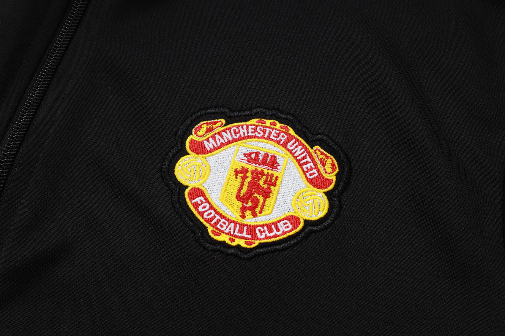 Tuta Manchester United nero zip 2025/26