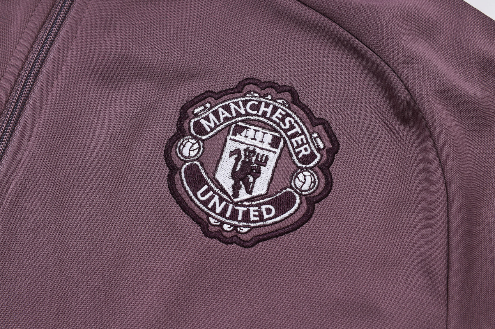 Tuta Manchester United prugna zip intera 2025/26